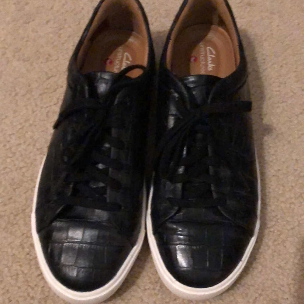 Clark’s “croc print” black leather sneakers